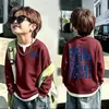 Camiseta de manga larga de punto gofre para niños, nuevo estilo primavera y otoño 2026, suéter para bebé, camiseta de dos en uno de moda para niños mayores