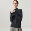 Nueva colección de otoño e invierno: prenda interior de punto de cachemira a la moda, suave y cómoda, color liso, cuello semi-alto, mangas largas y delicada con la piel para mujer
