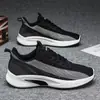 Disponible para dropshipping. Nuevos zapatos casuales transpirables de flyknit para hombre, zapatillas ligeras para correr y zapatillas deportivas transfronterizas