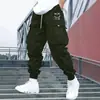 Pantalones cargo para hombre de estilo europeo y americano, con diseño de bolsillos, color verde militar, estilo jogger, secado rápido para exteriores, versátiles, al por mayor