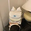 Bolsa Mini de Batom com Laço Moda Primavera e Verão para Mulheres, Nova 2026 Bolsa Transversal de Alto Padrão, Bolsa Pequena Versátil com Corrente