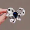 Broche novo estilo feminino senso de alta qualidade nicho broche atacado pino de alta qualidade temperamento fixo roupas terno joia pérola
