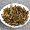 Colección al por mayor nannuoshan Arbor Qizi pastel de té crudo viejo 2009 357G Té Pu'er