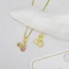 Comercio electrónico transfronterizo suministro al por mayor accesorios para joyería DIY fruta creativa incrustada circonita cereza piña colgante al por mayor