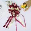 Decoração de local de festa de casamento com flor de puxar de fábrica transfronteiriça, decoração de carro de casamento, flor de puxar manual para motorista, embalagem, fita colorida, atacado