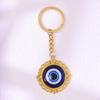 LLavero de ojo de diablo nuevo europeo y americano, llavero de ojo azul, colgante de aleación, joyería, accesorios de fábrica al por mayor