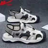 Zapatos sandalias de retroceso para hombre modelo verano 2026, puntera cerrada, transpirables, ligeros, casuales para deportes al aire libre, zapatos de vadeo al por mayor Z