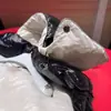 Versión Correcta m Home 23Ss Chaqueta de Plumas Corta de Tela de Nylon Barnizado para Hombres y Mujeres con Capucha Desmontable