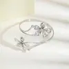 Colección de Pulseras de Brazo, Pulseras Abiertas Metálicas con Flor y Borla Transfronterizas Europeas y Americanas para Mujer, Moda Personalizada, Accesorios de Estilo Marino Sencillo