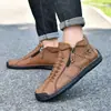Botas de trabajo para hombre sin cordones de media caña, zapatos planos para hombre con cremallera, botas Martin para exteriores, nuevas botas casuales de cuero para otoño e invierno