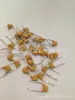 Capacitor Cerâmico Multicamada 100V334m 0.33UF 330NF Passo dos Pinos P5.08mm Tolerância de 20%