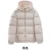 Chaqueta de plumón y algodón versátil negra de invierno 2026 estilo coreano corta con capucha holgada gruesa cálida abrigo acolchado