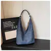 Bolsa de ombro casual estilo 2026 nova transfronteiriça de lazer, bolsa tote de lona e jeans de grande capacidade para o dia a dia de estudantes
