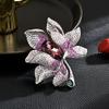 Temperamento de lujo retro europeo industria pesada elegante atmósfera de circonio completo exquisitos accesorios de broche de abrigo de flores una generación de cabello