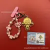Llavero de tela con logo de empresa personalizado Cadena para teléfono móvil Angela Lámina de oro puro Oro 999 Regalo de aniversario