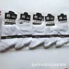 Calcetines casuales de vestir para hombre, calcetines de tubo de color liso negro, blanco y gris, para otoño e invierno, nuevo regalo, calcetines para caminar, soporte para generación