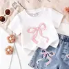 26 looks de verão para meninas europeias e americanas: nova camiseta estilo preppy com gravata borboleta + shorts jeans retrô, versátil e estiloso, atacado