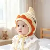 Bonito gorro de lana tejido para bebés en otoño e invierno, unisex, con protección para las orejas y características a prueba de viento, adecuado para niños pequeños como gorro de invierno