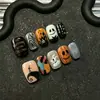 Uñas vestibles de Halloween superventas transfronterizas europeas y americanas, piezas de arte de uñas de calabaza, calavera y fantasma puramente hechas a mano, productos terminados para venta al por mayor de alta gama