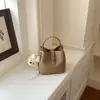 Bolso de Mano de Oficina Transfronterizo de Moda para Mujer, Nuevo Estilo 2026, Bolso Cubo de Hombro Cruzado de Moda para Verano