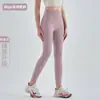 Pantalones deportivos de fitness sin costuras de nueve puntos para mujer, estilo europeo y americano, tela cepillada, secado rápido, ajustados, de cintura alta, levanta glúteos, para exportación