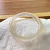 Venta al por mayor del fabricante Pulsera de Jade Natural Color Champagne Dorado Tipo Hielo Alto para Mujer Pulsera de Roca de Jadeíta Espuma de Agua Venta al por Mayor en Transmisión en Vivo