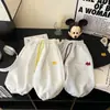 Pantalones deportivos bordados de estilo coreano para niños, nueva colección de primavera para niños y niñas, elegantes y modernos con un diseño de pierna cónica