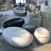 Taburete cóncavo de fibra de vidrio tipo guijarro centro comercial Parque asiento de piedra ovalado para exteriores asiento de ocio con forma creativa