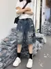 Shorts de mezclilla rotos con graffiti para mujer, estilo fino de verano, nuevos pantalones de cinco puntos de estilo americano 2026, talla grande, adelgazantes para mujeres de talla grande