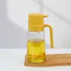 Tanque de aceite de vidrio para cocina doméstica de fábrica, botella rociadora, rociar hacia abajo, doble propósito, botella de aceite integrada, sellado de aceite sin goteo, tanque de aceite