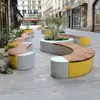 Banco curvo para jardineras de exterior, ideal para calles comerciales, plazas y espacios públicos. Jardinera de hierro forjado, producto terminado. Asiento para macizos de flores.