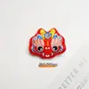 Broche de felpa Xingshi lindo Danza del León año Año del Dragón decoración prendedor de ropa bufanda festivo regalo de Año Nuevo