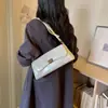 Venta al por mayor transfronteriza de bolsos de mujer de alta gama para nicho 2026 Nueva moda Bolso de hombro retro debajo del brazo Bolso cruzado versátil