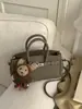 Bolsa Yuezi Fashion Tendência Casual Texturizada 2026 Primavera Nova Estilosa Nicho Moda Feminina Bolsa de Ombro Transversal