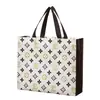 Bolsas de Regalo No Tejidas en Stock al por Mayor, Tienda de Ropa Femenina de Moda al por Mayor, Bolsas Tote No Tejidas Promocionales