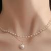 Cadena de cuello sencilla de moda de primavera y verano, diseño de nicho con personalidad, collar de perlas de doble capa, cadena de clavícula dulce para dama, venta al por mayor