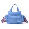 2026 Nova Bolsa Casual Feminina Mini Versátil de Nylon Grande Capacidade Ombro Único Transversal Bolsa de Mão para Mãe em Tecido Oxford