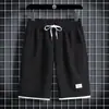 Calça Waffle de Verão Masculina Casual Tendência Versátil Calça Jovem Cadarço Calça de Cinco Pontos Nova Roupa Externa Calça