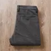 Estación europea otoño e invierno gruesos de lana para hombre elásticos antiarrugas suaves de negocios de alta gama lavados cepillados rectos pantalones casuales