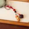 Llave de cadena Colgante Ruyi de Palisandro Natural Caqui Buena Acción Cacahuete Colgante de Bolsa Nuevo Estilo Chino Antiguo Colgante de Cuerda de Wadeo