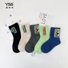 Meias Infantis Yishuangshuang Outono e Inverno Novas Estilo Coreano Meia de Cano Médio com Letra Algodão Penteado Meias de Basquete para Estudantes Meias de Algodão Sem Costura