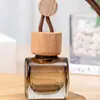 Colgante de botella de vidrio con tapa redonda pequeña de color marrón degradado con cuerda gruesa, botella de perfume popular, botella vacía, colgante para colgar en el coche, botella de aromaterapia