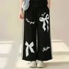 Conjunto de Dos Piezas para Niñas Mayores: Camiseta de Encaje de Manga Corta y Pantalones de Pierna Ancha de Moda, Conjunto de Ropa de Verano Nuevo con Bloques de Color, Dulce y Fresco