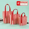 Bolsa de lona a rayas de Amazon en stock, bolsa de lona para ventas transfronterizas, bolsa de lona colorida para fines publicitarios y de regalo