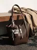 Bolso cruzado para mujer 2026 Diseño de nicho Bolso de axila francés Bolso de mano de alta gama Bolso de hombro retro a la moda para el trabajo