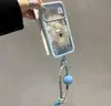 El cordón West Highland se transforma instantáneamente en una funda transparente de cielo estrellado de dopamina adecuada para iPhone 17 Pro Max y iPhone 16