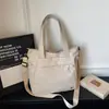 Bolso de Hombro Casual Minimalista Blanco Leche con Múltiples Bolsillos y un Toque Artístico para Estudiantes Universitarias, Adecuado para Viajes Matutinos, Viajes y Compras