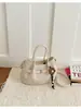 Bolso bandolera retro al por mayor 2026 para mujer, nuevo bolso tipo cubo de alta gama, bolso de hombro de moda para el día a día