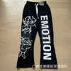 25 Venta al por mayor transfronteriza Tendencia de Belleza Emoción Mixta Serie de Diamantes Calientes Camisetas Sueltas de Manga Corta High Street Hip-Hop para Hombres y Mujeres en