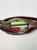 Bolso tipo dumpling simple y elegante de color sólido para mujer, nuevo bolso de mano Otoño 2026, bolso versátil de hombro y cruzado